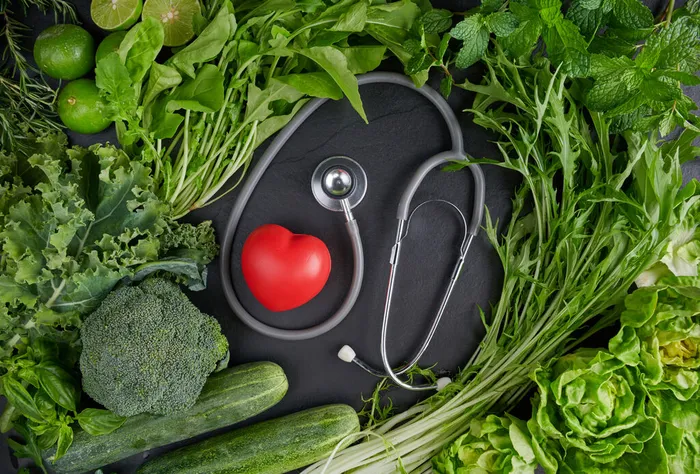 green-organic-vegetarian-products-with-heart-near-stethoscope